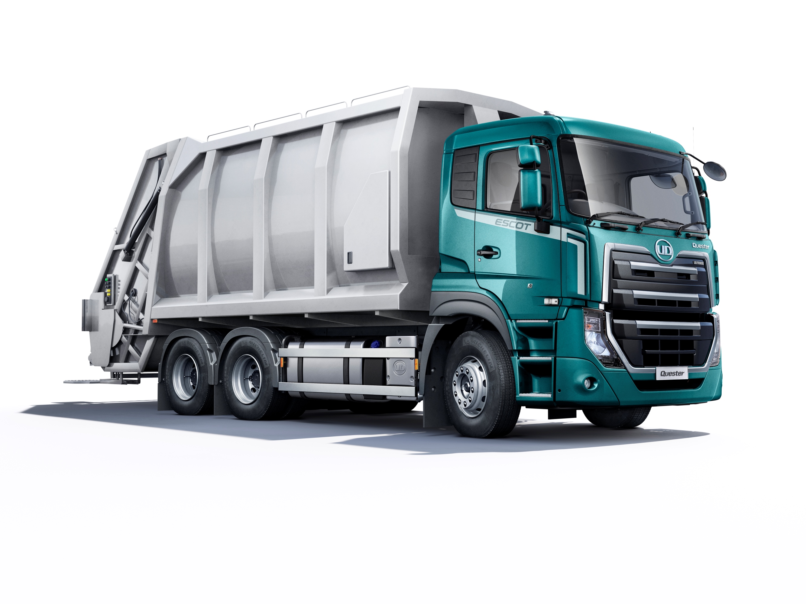 Lori la taka taka la kijani na kijivu limesimama upande wa kulia.