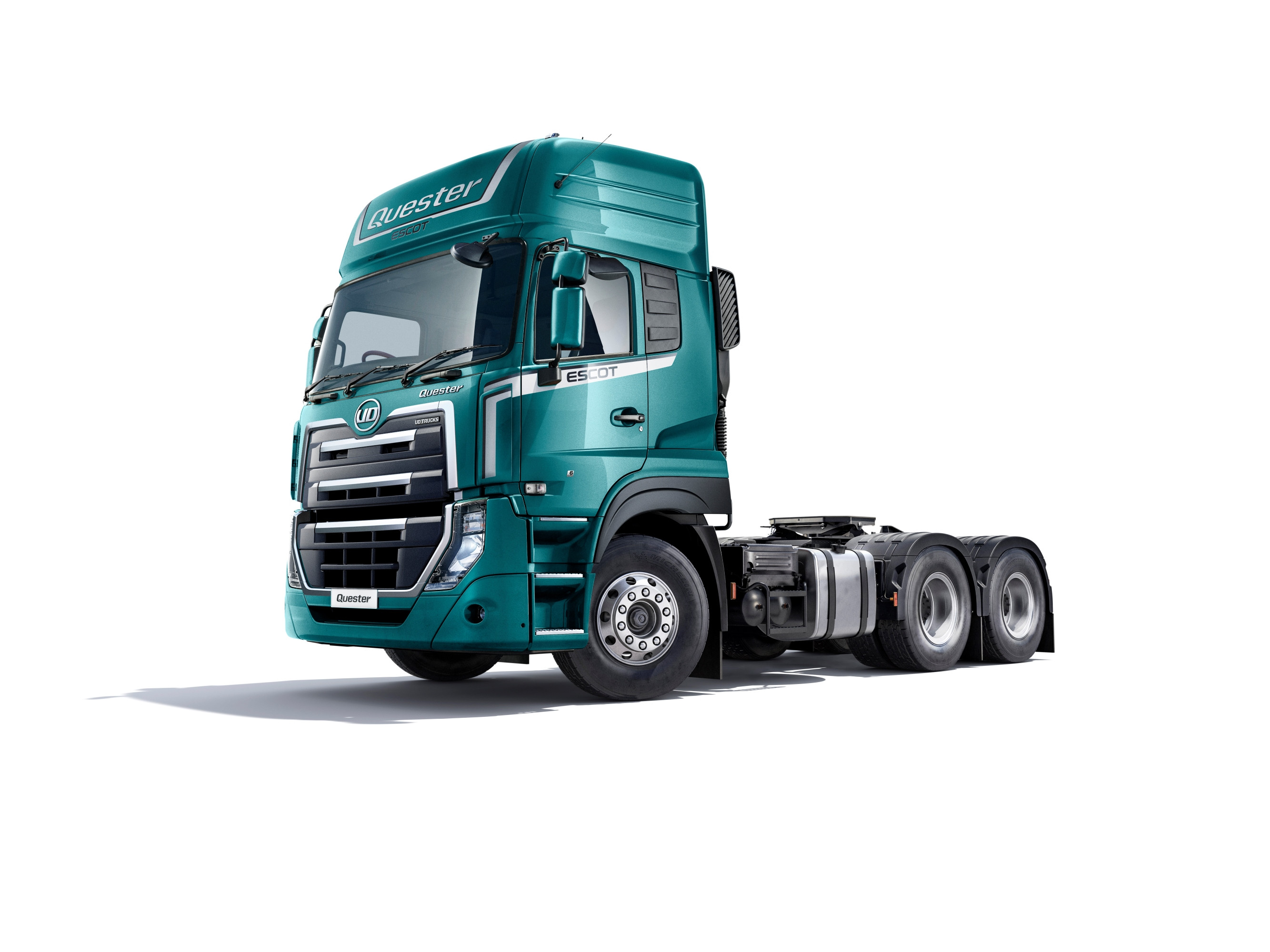 Green semi-truck cab on white background, side and front visible.