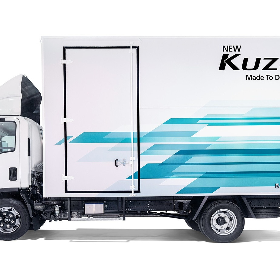 White box truck with blue graphic and "Kuzer" branding on the side.