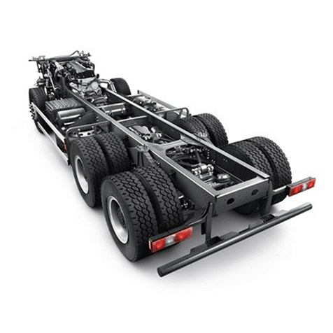 Casis trak berat dengan enam tayar besar, dilihat dari sudut belakang.